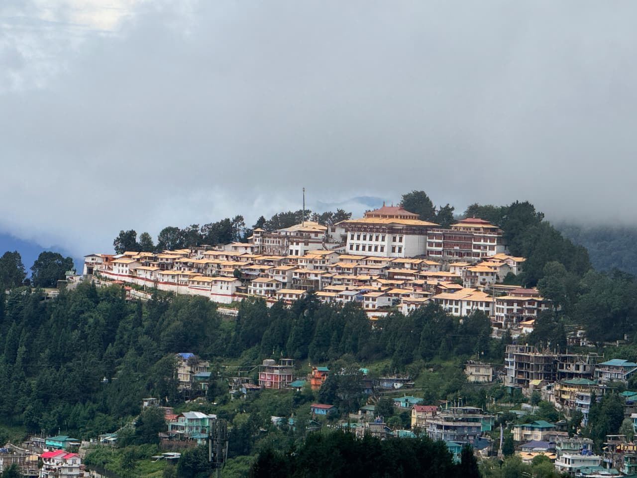 Tawang Monastery complex spread along a green ridge above the town